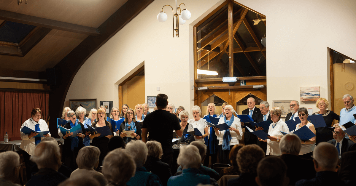 Beccles Community Choir singing in performance